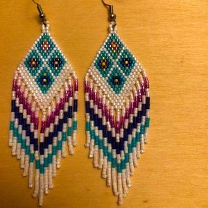 Hand beaded tribal fringe earring’s